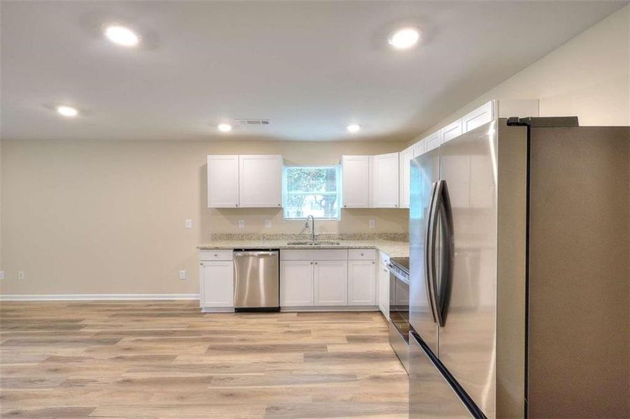 Furnished interior view inside a new home in , Monroe (Image 6).