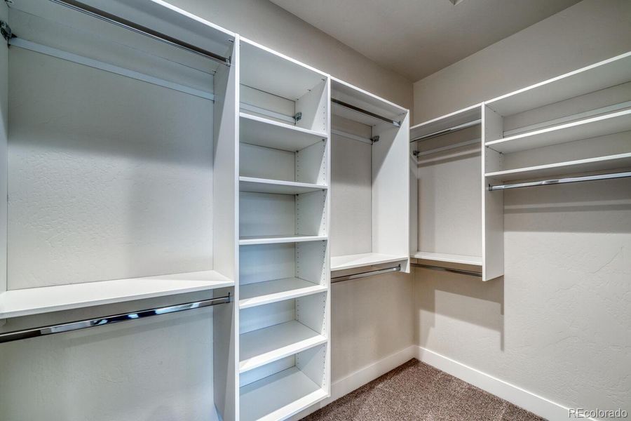 walk in closet with built in storage