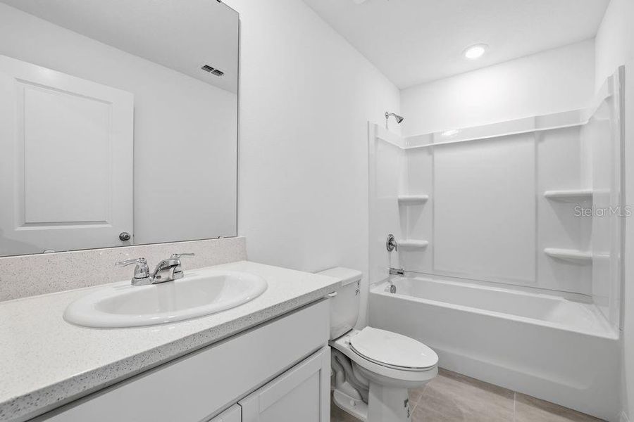 Furnished interior view inside a new home in The Towns at Firethorn, Parrish (Image 7).