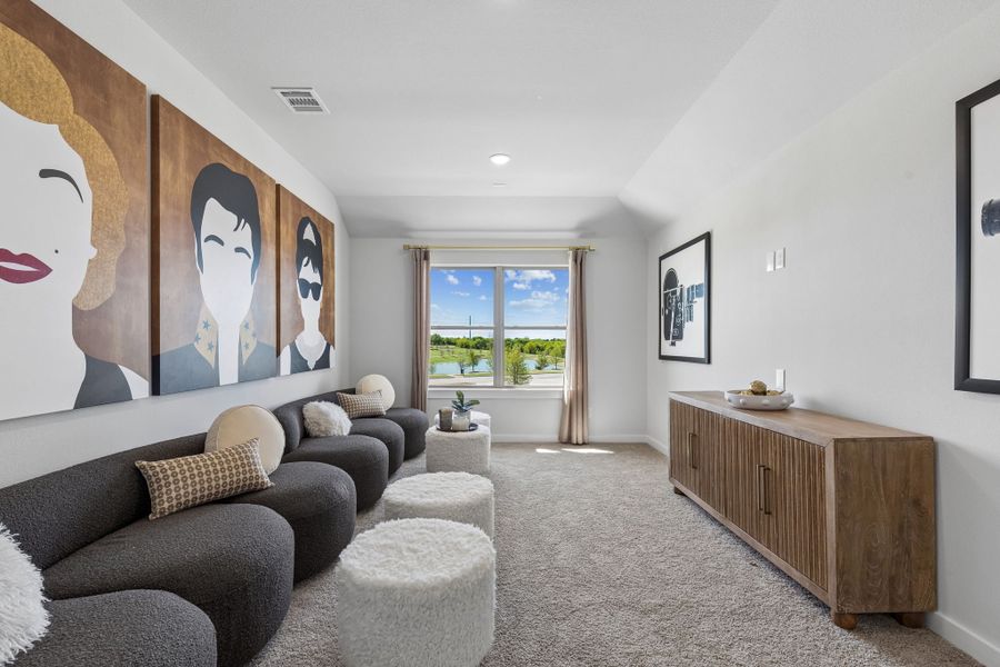 Media Room in a Sunset Ranch Winters Model Home in Gunter TX by Trophy Signature Homes