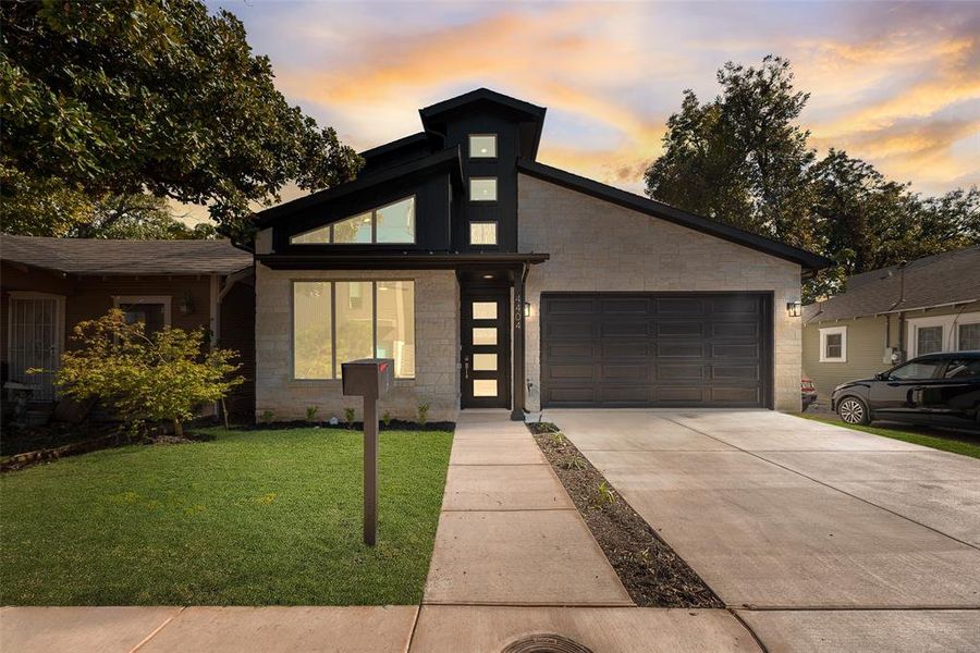 Front exterior of a new home in , Dallas, TX, highlighting curb appeal (Image 18).