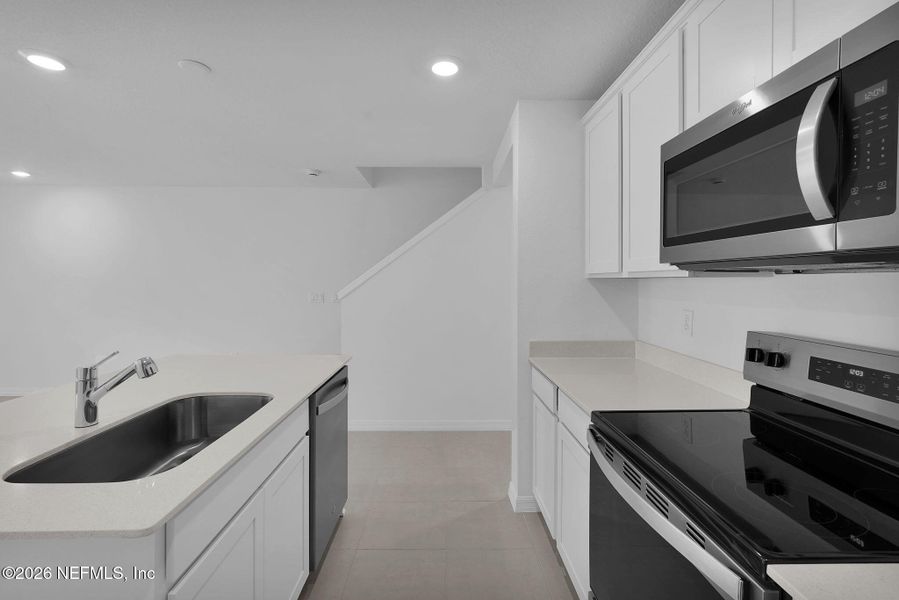 Furnished interior view inside a new home in , Jacksonville (Image 11).