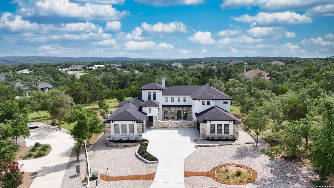 Front exterior of a new home in , New Braunfels, TX, highlighting curb appeal (Image 29).
