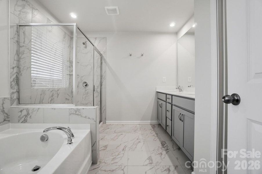 Furnished interior view inside a new home in Waxhaw Landing, Monroe (Image 18).