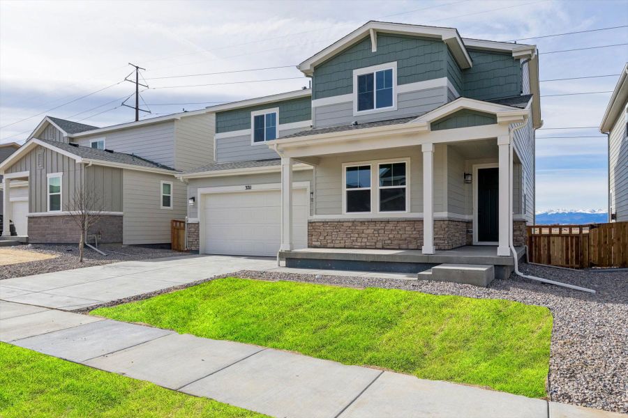 A house with a front yard. A house with a front yard.
