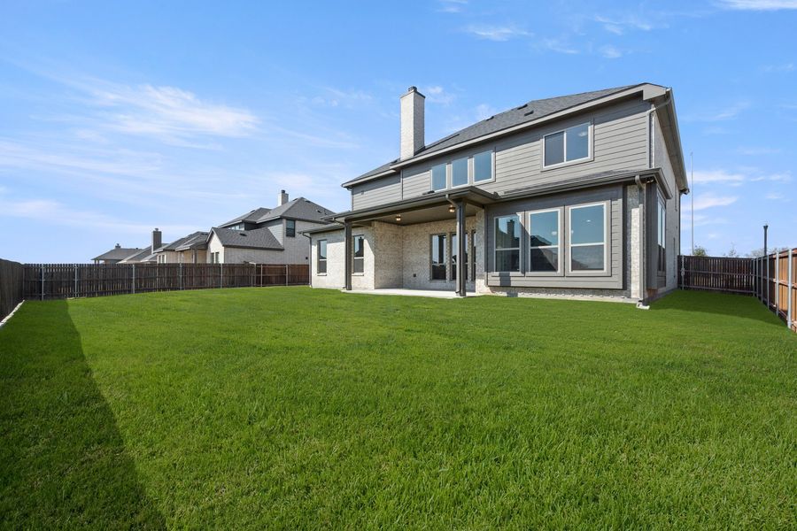 Exterior details and patio area of a home in Hayes Crossing, Midlothian (Image 3). Exterior details and patio area of a home in Hayes Crossing, Midlothian (Image 3).