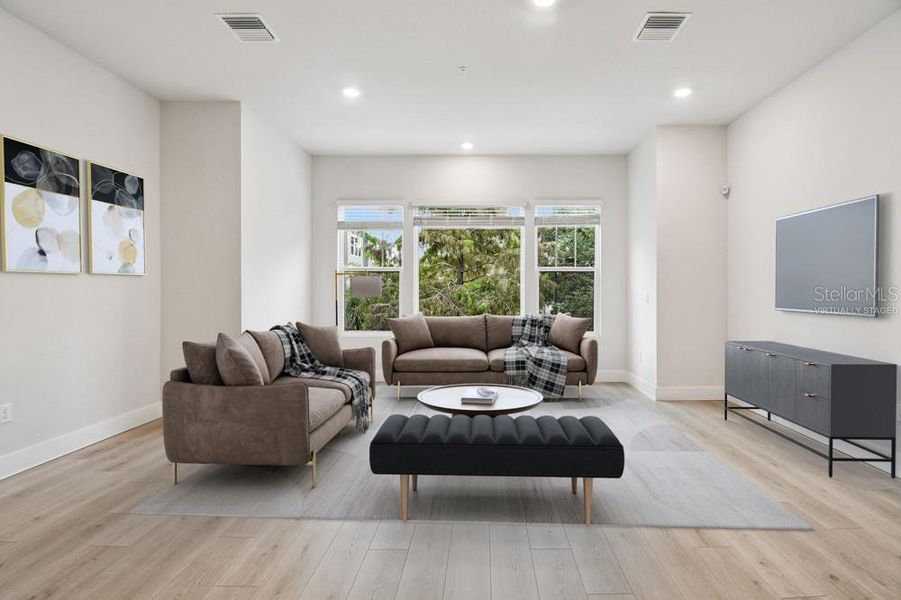 Furnished interior view inside a new home in Towns at Union, St. Petersburg (Image 5).