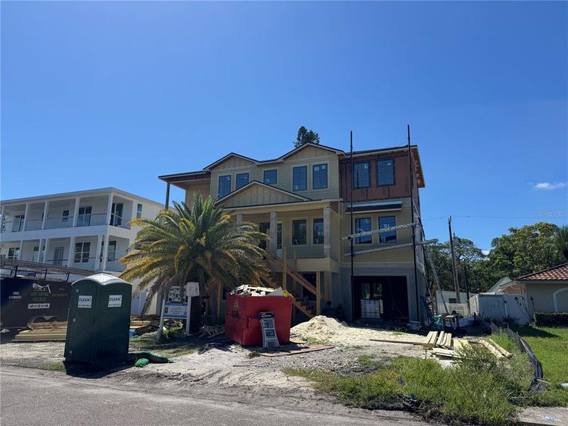Front exterior of a new home in , St. Petersburg, FL, highlighting curb appeal (Image 15).
