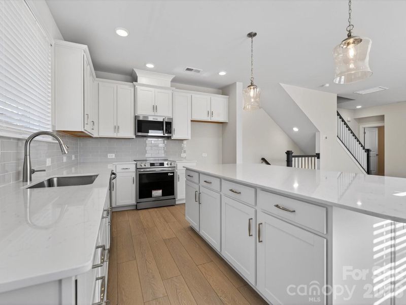 Furnished interior view inside a new home in Central Living at Craig, Charlotte (Image 12).