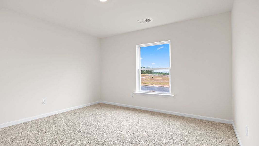 Spacious, unfurnished interior of a new home in Bentley Park, Greenwood (Image 14).