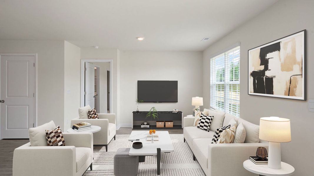 Representative furnished interior of a home built from the FREEPORT by D.R. Horton in Wilson's Ridge, Wilson's Mills (Image 7).