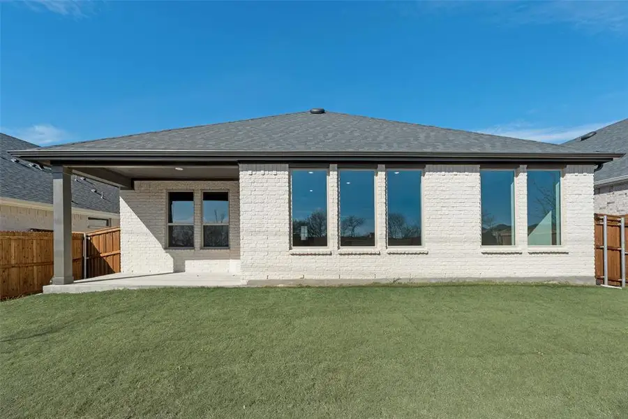 Exterior details and patio area of a home in Villages of Hurricane Creek, Anna (Image 4). Exterior details and patio area of a home in Villages of Hurricane Creek, Anna (Image 4).
