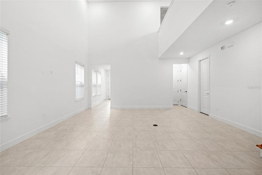 Spacious, unfurnished interior of a new home in Harvest At Ovation 50s, Winter Garden (Image 24).