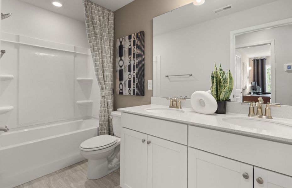 Furnished interior view inside a new home in Poets Walk, Whitsett (Image 7).