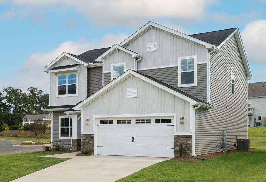 Representative exterior photo of a completed home built from the The McKee by Cothran Homes in Holly Ridge, Greenville, SC (Image 32). Representative exterior photo of a completed home built from the The McKee by Cothran Homes in Holly Ridge, Greenville, SC (Image 32).