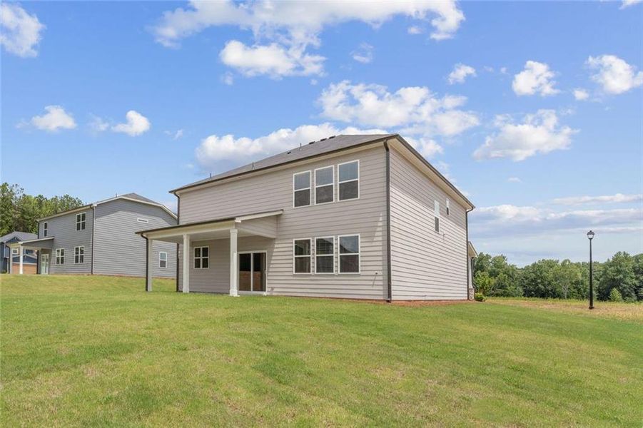 Exterior details and patio area of a home in Reserve at Gum Springs, Jefferson (Image 19).