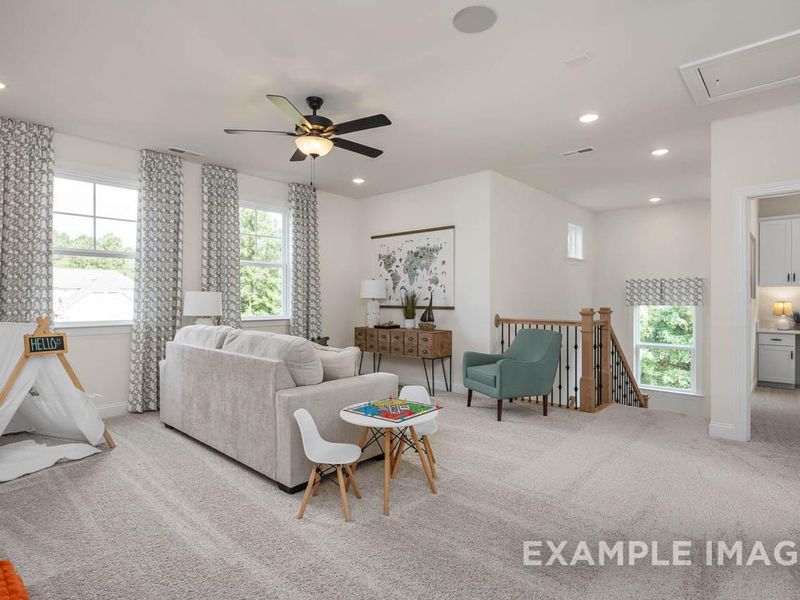 Furnished interior view inside a new home in Addison West, Holly Springs (Image 6).