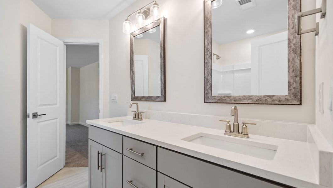 Representative furnished interior of a home built from the LONDON by D.R. Horton in Adams Glen, Greenville (Image 12).