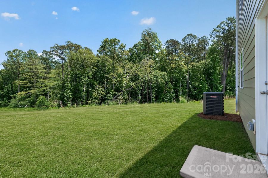 Exterior details and patio area of a home in Creekside Cottages, Bessemer City (Image 4).