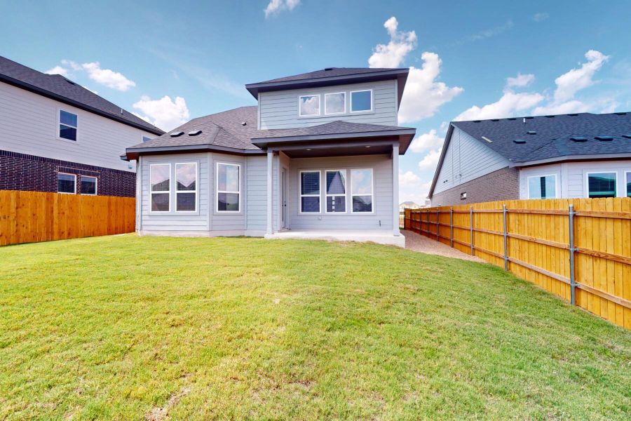 Exterior details and patio area of a home in Cascades at Onion Creek, Austin (Image 2).