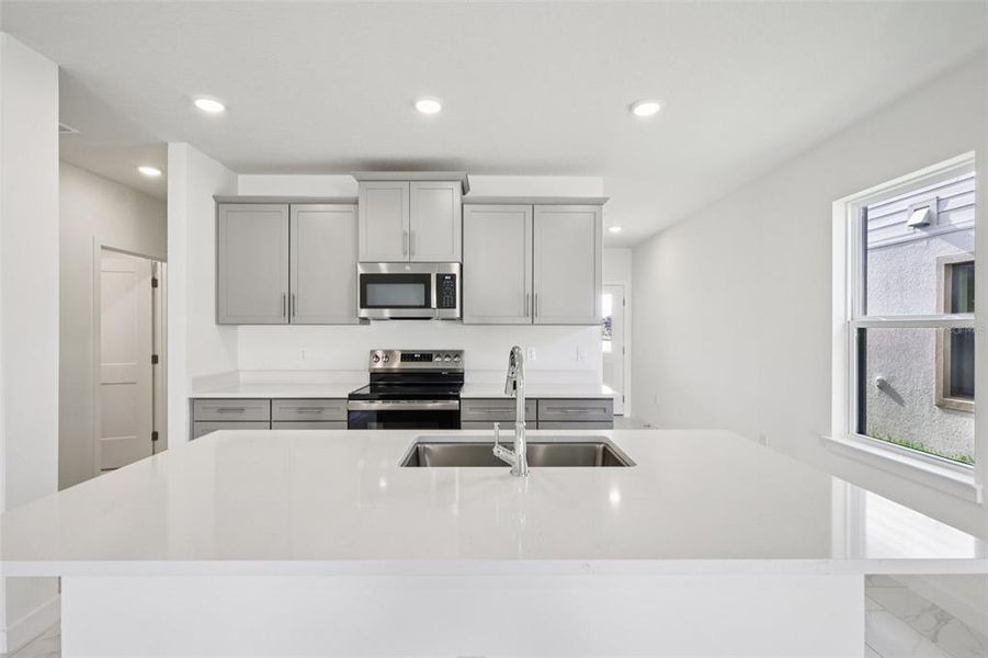 Furnished interior view inside a new home in Grasslands West, Lakeland (Image 8).