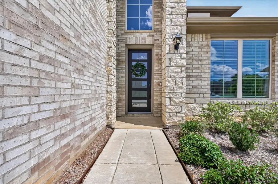 Exterior details and patio area of a home in Audubon, Magnolia (Image 24).
