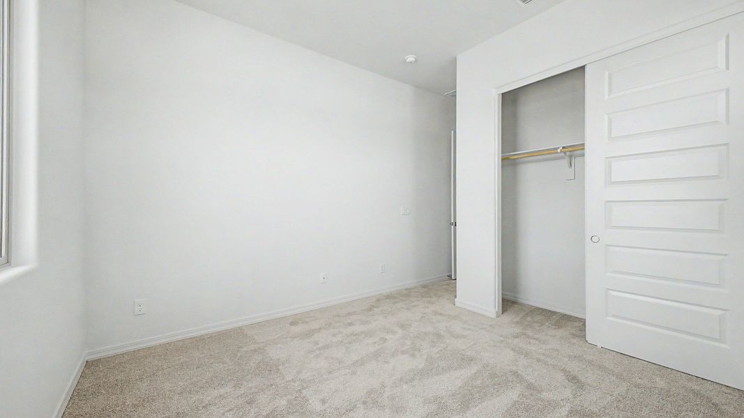 Representative furnished interior of a home built from the Montoro by DRB Homes in Windrose, Waddell (Image 16).
