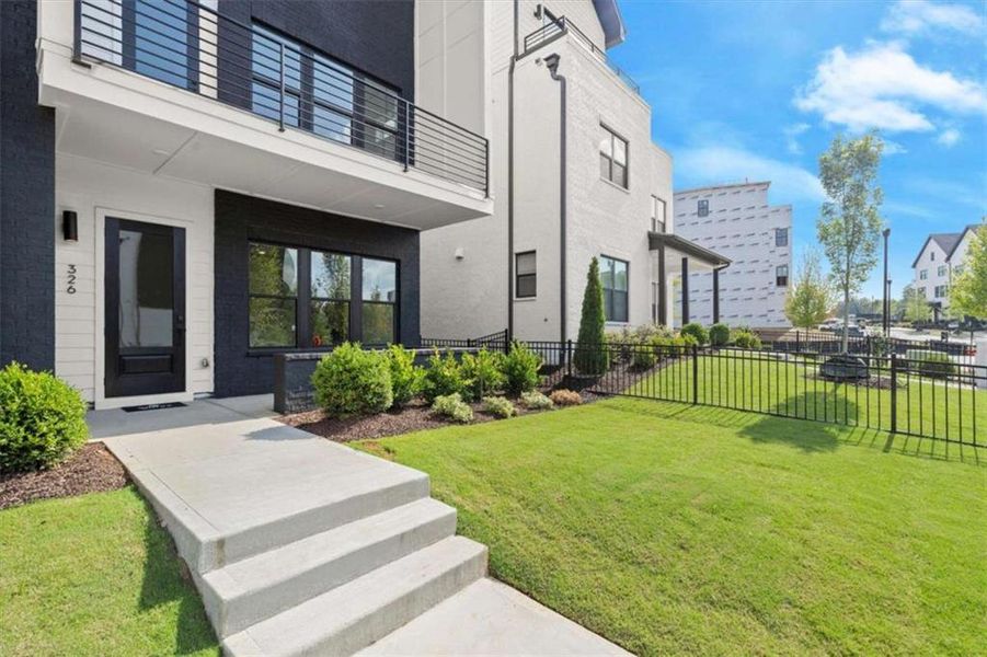 Exterior details and patio area of a home in The Gathering – Alpharetta, Alpharetta (Image 27).