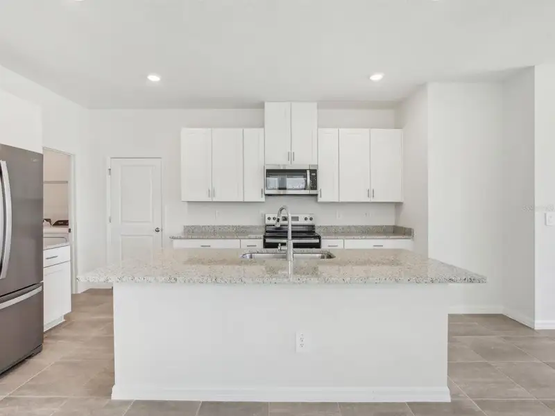 Furnished interior view inside a new home in Two Rivers - Premier Series, Zephyrhills (Image 6). Furnished interior view inside a new home in Two Rivers - Premier Series, Zephyrhills (Image 6).