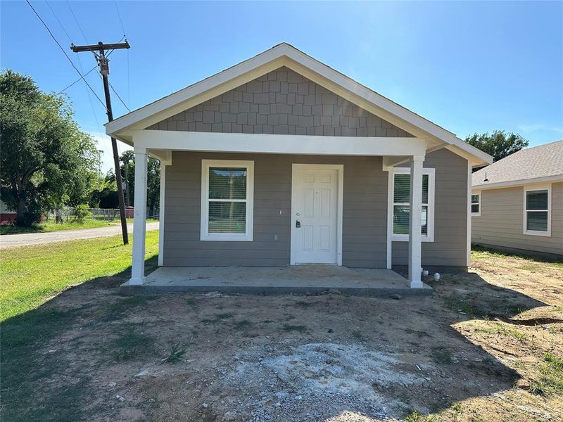 View of front facade featuring covered porch View of front facade featuring covered porch