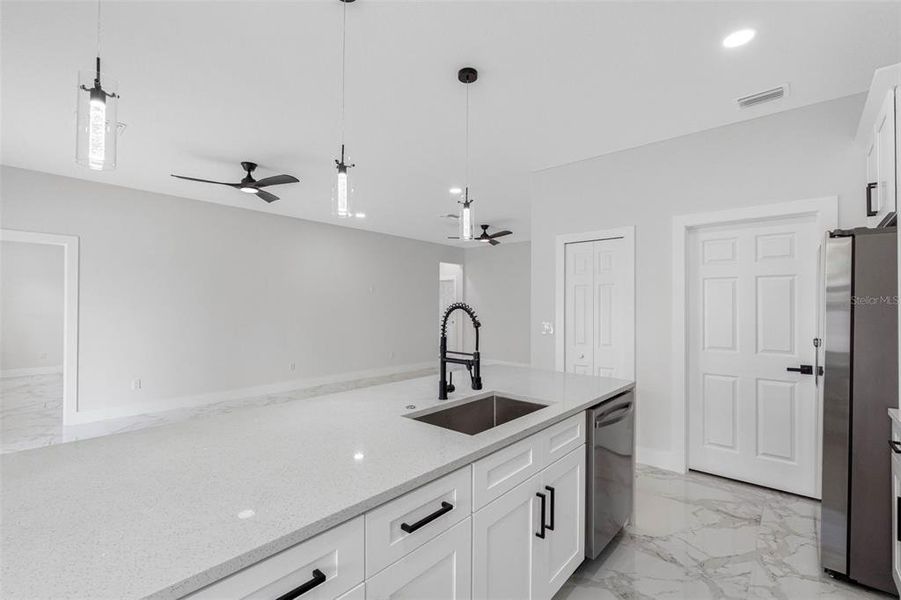Furnished interior view inside a new home in , Port Richey (Image 6).