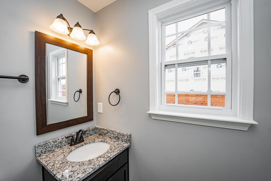 Representative interior finishes for a home built from the Saxon by Enchanted Homes in Guadalupe Heights, Seguin (Image 17).