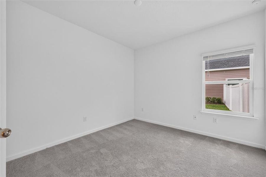 Spacious, unfurnished interior of a new home in Heath Preserve, Ocala (Image 40).
