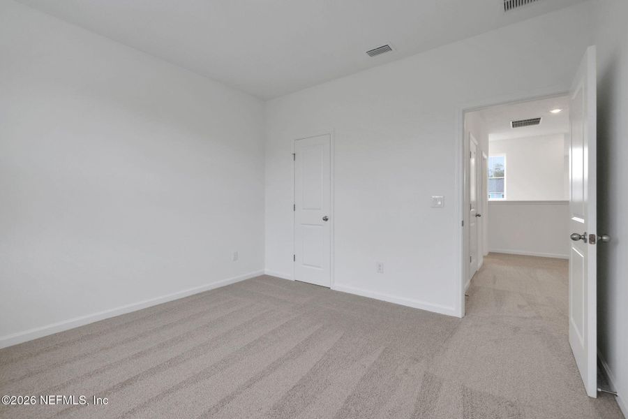 Spacious, unfurnished interior of a new home in The Hammock at Palm Harbor, Palm Coast (Image 27).