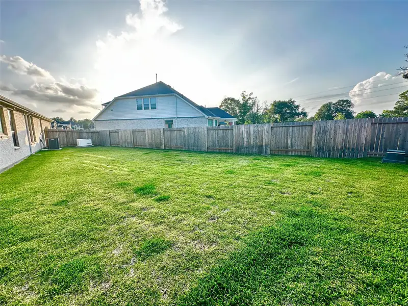 Exterior details and patio area of a home in , Tomball (Image 4).