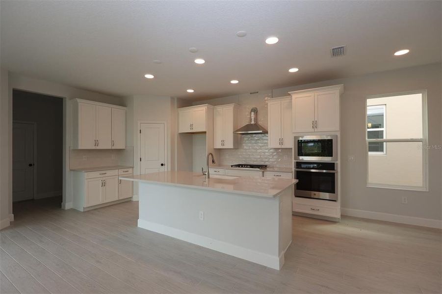 Furnished interior view inside a new home in Lake Star at Ovation, Winter Garden (Image 15).
