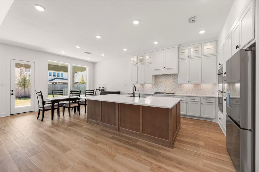 Furnished interior view inside a new home in Bridgeland, Cypress (Image 17).