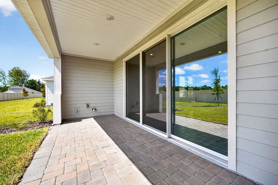 Exterior details and patio area of a home in Headwaters at Lofton Creek, Yulee (Image 21).