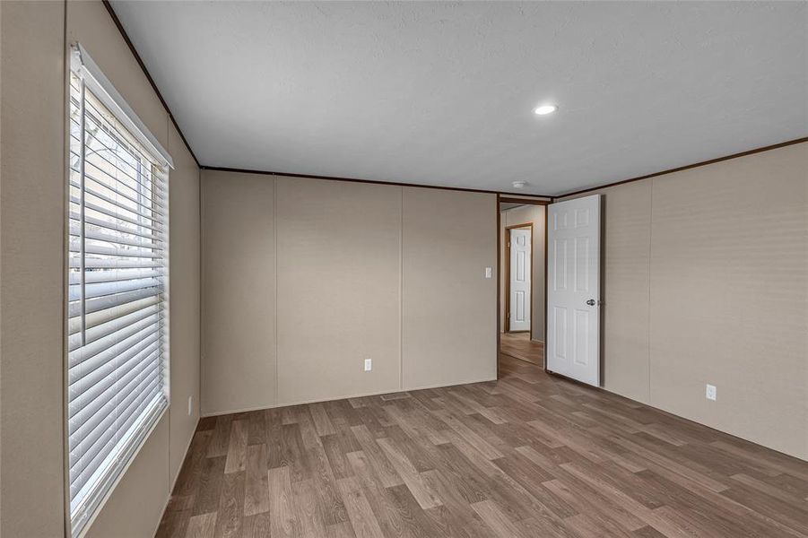 Spare room featuring light hardwood / wood-style floors