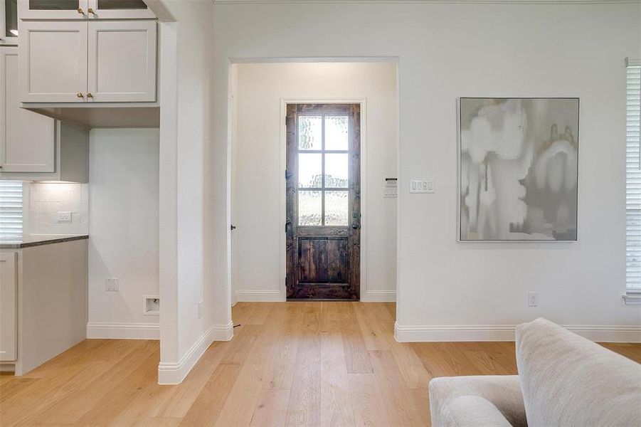 Foyer entrance featuring light wood-type flooring