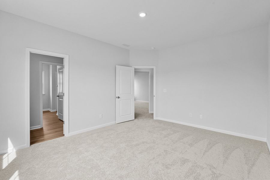 Spacious, unfurnished interior of a new home in Lilah Grove, Summerfield (Image 39).