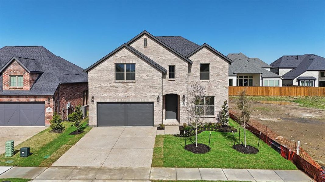 Front exterior of a new home in Brookhollow West, Prosper, TX, highlighting curb appeal (Image 2). Front exterior of a new home in Brookhollow West, Prosper, TX, highlighting curb appeal (Image 2).