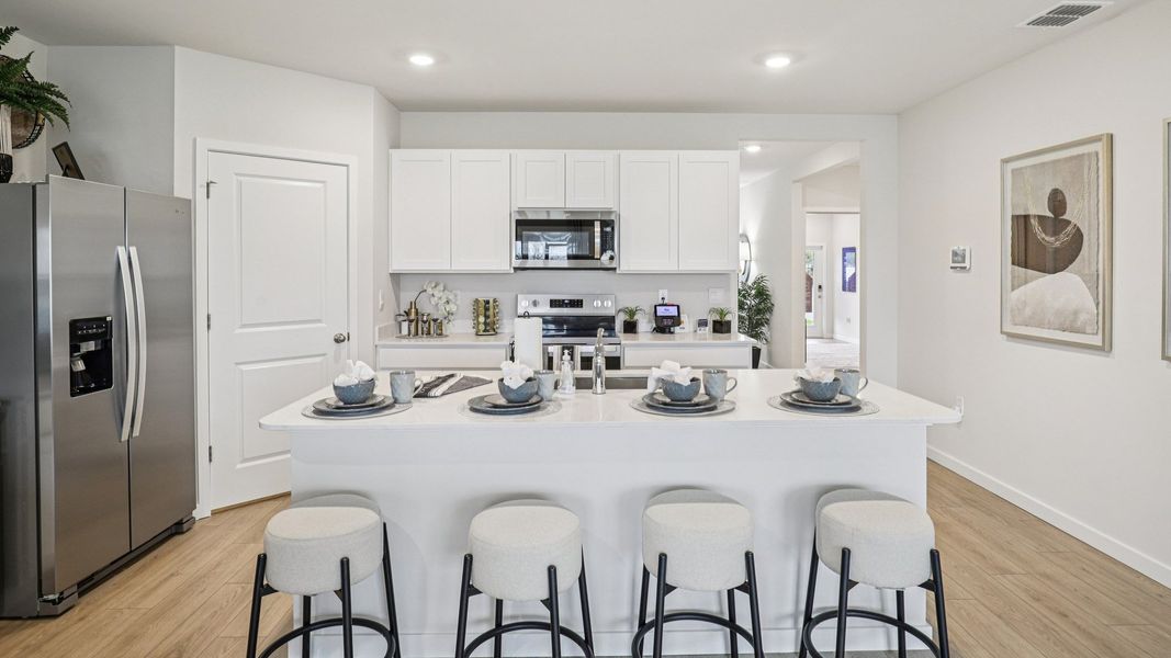 Furnished interior view inside a new home in Magnolia Landing Express, Fort Myers (Image 15).