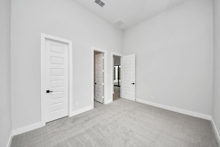 This downstairs bedroom is a full suite.