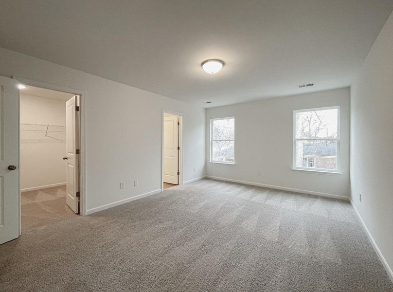 Spacious, unfurnished interior of a new home in East Main Townes, Spartanburg (Image 21).