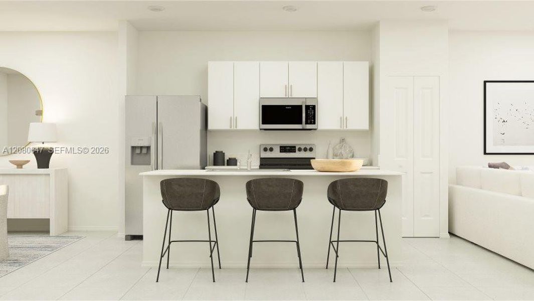 Furnished interior view inside a new home in Le Jardine, Florida City (Image 12).