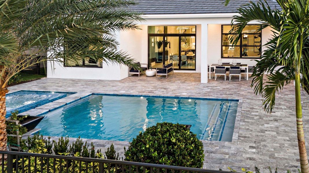 Exterior details and patio area of a home in Cresswind Palm Beach at Westlake, Westlake (Image 22).