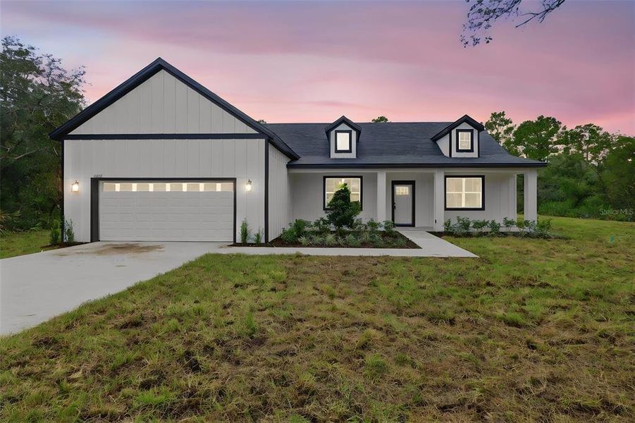 Front exterior of a new home in , Eustis, FL, highlighting curb appeal (Image 21).