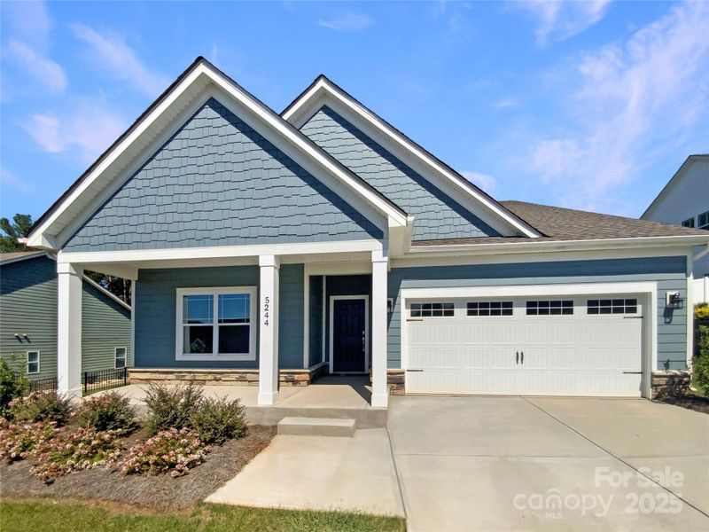 Front exterior of a new home in Edgewater, Lancaster, SC, highlighting curb appeal (Image 2). Front exterior of a new home in Edgewater, Lancaster, SC, highlighting curb appeal (Image 2).