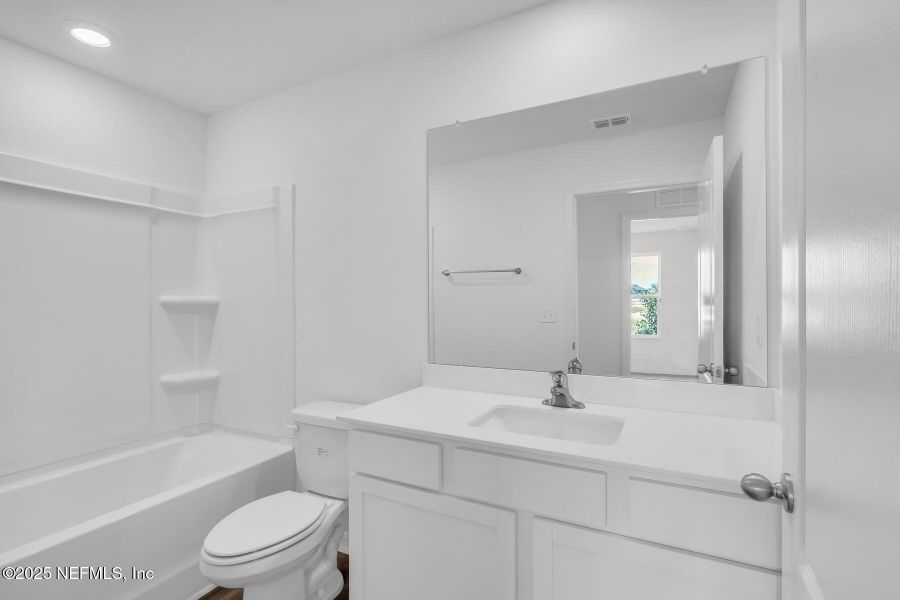 Furnished interior view inside a new home in Rolling Hills, Green Cove Springs (Image 13).